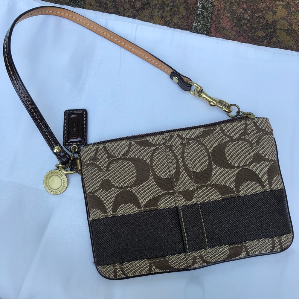 NWOT Coach wristlet in brown